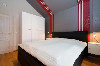 Ein Bett oder Betten in einem Zimmer der Unterkunft Strandpark Sierksdorf H072