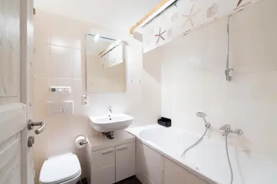 Ein Badezimmer in der Unterkunft Strandpark Sierksdorf H072