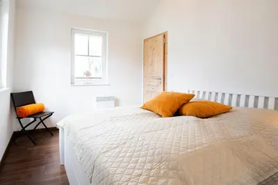 Ein Bett oder Betten in einem Zimmer der Unterkunft Strandpark Sierksdorf H048