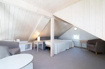 Ein Bett oder Betten in einem Zimmer der Unterkunft Strandpark Sierksdorf H094