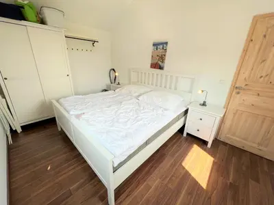 Ein Bett oder Betten in einem Zimmer der Unterkunft Strandpark Sierksdorf H049