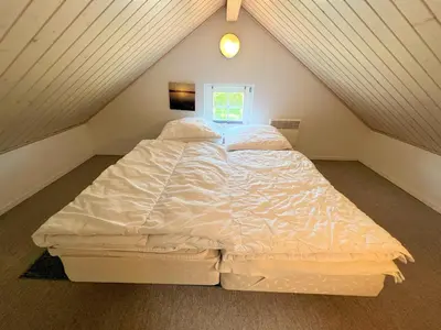 Ein Bett oder Betten in einem Zimmer der Unterkunft Strandpark Sierksdorf H008