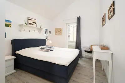 Ein Bett oder Betten in einem Zimmer der Unterkunft Strandpark Sierksdorf H052