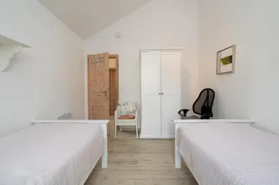 Ein Bett oder Betten in einem Zimmer der Unterkunft Strandpark Sierksdorf H052