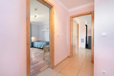 Ein Bett oder Betten in einem Zimmer der Unterkunft Strandpark Sierksdorf H023