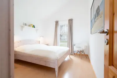 Ein Bett oder Betten in einem Zimmer der Unterkunft Strandpark Sierksdorf H058