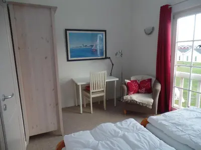Ein Bett oder Betten in einem Zimmer der Unterkunft Strandpark Sierksdorf H010