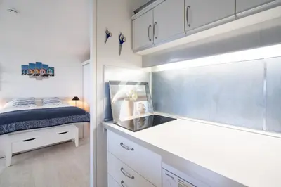 Ein Bett oder Betten in einem Zimmer der Unterkunft Panoramic App B08-6