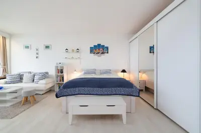 Ein Bett oder Betten in einem Zimmer der Unterkunft Panoramic App B08-6