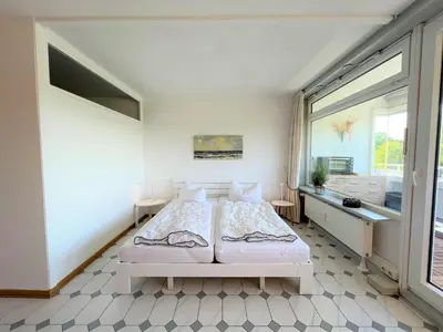 Ein Bett oder Betten in einem Zimmer der Unterkunft Panoramic App B02-10