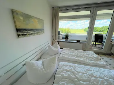 Ein Sitzbereich in der Unterkunft Panoramic App B02-10