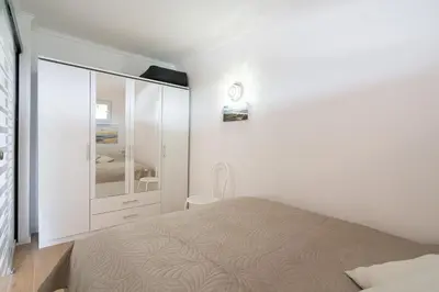 Ein Bett oder Betten in einem Zimmer der Unterkunft Ferienpark Sierksdorf App 793 - Lillis Oase