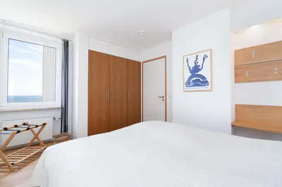 Ein Bett oder Betten in einem Zimmer der Unterkunft Ferienpark Sierksdorf App 340 - Strandlage