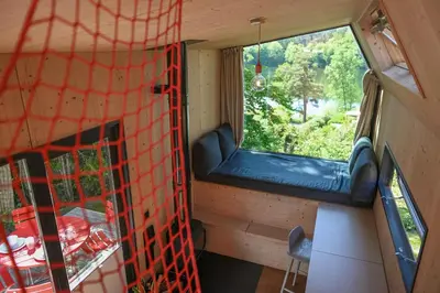 Ein Bett oder Betten in einem Zimmer der Unterkunft Tiny House Pioneer 1 - Salemer See