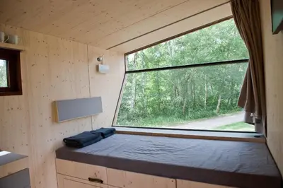 Ein Bett oder Betten in einem Zimmer der Unterkunft Sleep Space 3 - Salemer See