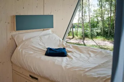 Ein Bett oder Betten in einem Zimmer der Unterkunft Sleep Space 4 - Salemer See