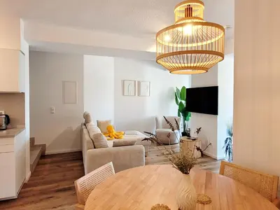 TV/Unterhaltungsangebot in der Unterkunft Ferienwohnung mit Meerblick und Terrasse - Nur 50 Meter zum Strand - inklusive eigenem Parkplatz und Fahrradunterstellplatz