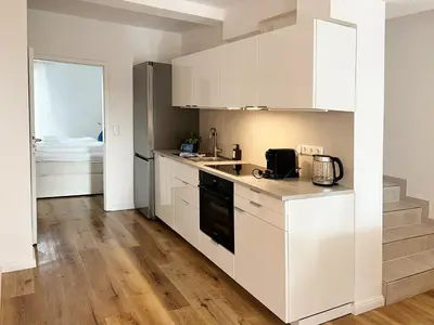 Küche/Küchenzeile in der Unterkunft Ferienwohnung mit Meerblick und Terrasse - Nur 50 Meter zum Strand - inklusive eigenem Parkplatz und Fahrradunterstellplatz