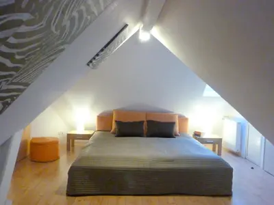 Ein Bett oder Betten in einem Zimmer der Unterkunft Likedeeler Am Stadthafen