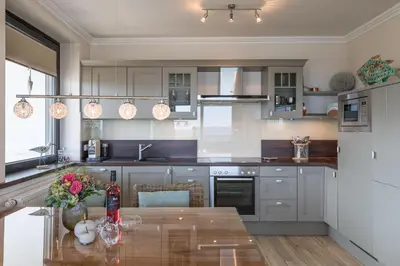 Küche/Küchenzeile in der Unterkunft Herzbergs Ferienwohnung Meersehen