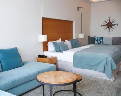 Ein Bett oder Betten in einem Zimmer der Unterkunft SeeHuus Lifestyle Hotel