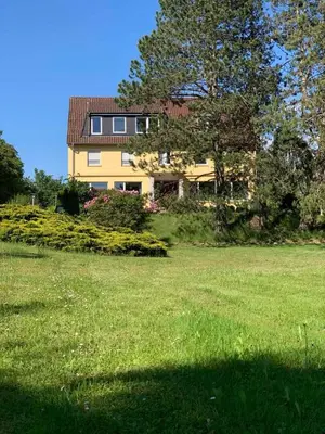 Ein Garten an der Unterkunft Gasthaus AFINA