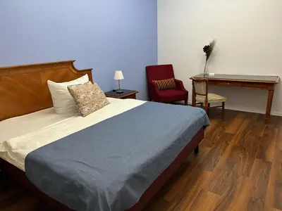 Ein Bett oder Betten in einem Zimmer der Unterkunft Gasthaus AFINA