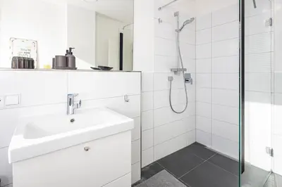 Ein Badezimmer in der Unterkunft Ostsee Suite 1 - Strandperle