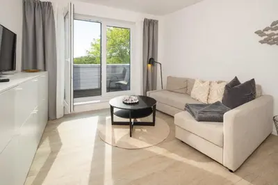 Ein Sitzbereich in der Unterkunft Ostsee Suite 1 - Strandperle