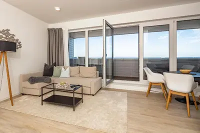 Ein Sitzbereich in der Unterkunft Ostsee Suite 3 - Strandperle