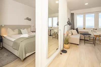 Ein Bett oder Betten in einem Zimmer der Unterkunft Ostsee Suite 4 - Strandperle