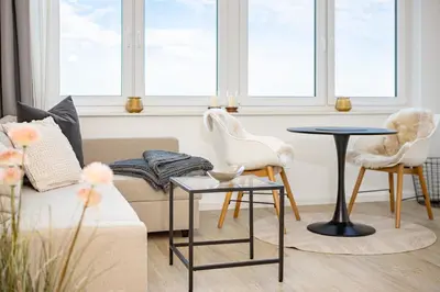 Ein Sitzbereich in der Unterkunft Ostsee Suite 4 - Strandperle