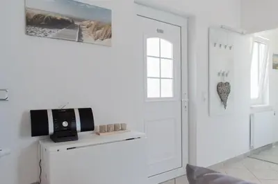 TV/Unterhaltungsangebot in der Unterkunft Ferienwohnung 3 Haus Meeresrauschen - Bungalow