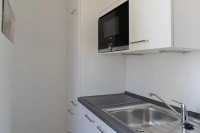 Küche/Küchenzeile in der Unterkunft Ferienwohnung 3 Haus Meeresrauschen - Bungalow