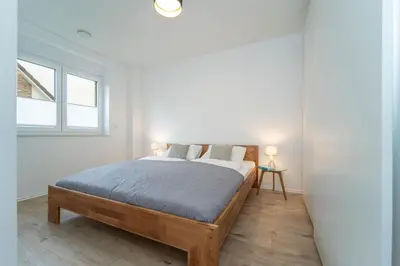 Ein Bett oder Betten in einem Zimmer der Unterkunft Ostseelaune