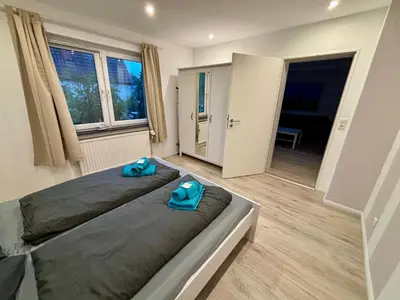 Ein Bett oder Betten in einem Zimmer der Unterkunft Ferienwohnung zwischen Lübeck und Travemünde