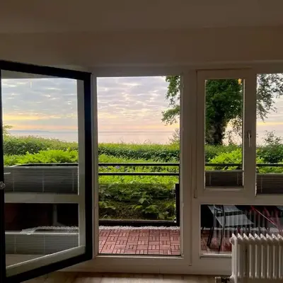 Moderne 3-Zi-Wohnung mit Meerblick direkt am Strand