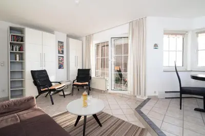 Ein Sitzbereich in der Unterkunft Strandresidenz Sierksdorf Nr 05