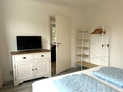 Ein Bett oder Betten in einem Zimmer der Unterkunft Haffliebe 2