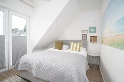 Ein Bett oder Betten in einem Zimmer der Unterkunft Kleines Glück