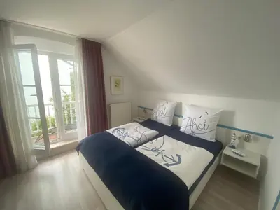 Ein Bett oder Betten in einem Zimmer der Unterkunft Haus Südstrand, Scharbeutz-Sierksdorf