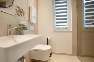 Ein Badezimmer in der Unterkunft View 91 Strandkieker