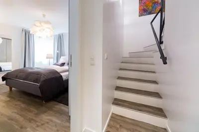 Ein Bett oder Betten in einem Zimmer der Unterkunft MeerGlück Möwenberg 14 Scharbeutz