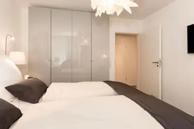 Ein Bett oder Betten in einem Zimmer der Unterkunft MeerGlück Möwenberg 14 Scharbeutz