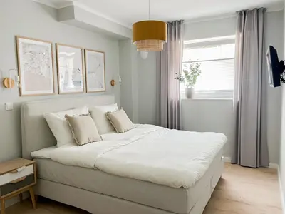 Ein Bett oder Betten in einem Zimmer der Unterkunft My Baltic Sea - Ferienwohnungen im Seaside House