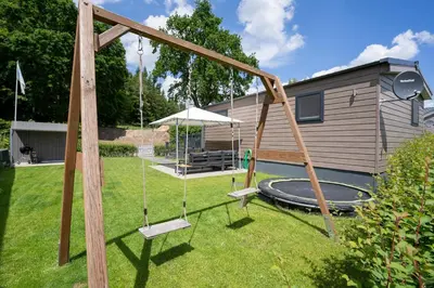 Ein Garten an der Unterkunft Ostseecamp Lübecker Bucht Casa del Sol mit kostenfreier Saunanutzung