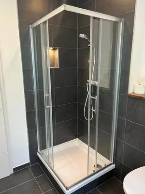 Ein Badezimmer in der Unterkunft Zentrale und schöne Ferienwohnung II