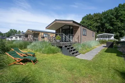 Ein Garten an der Unterkunft Ostseecamp Lübecker Bucht Casa del Mar mit kostenfreier Saunanutzung