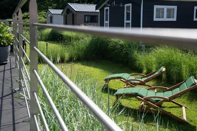 Ein Garten an der Unterkunft Ostseecamp Lübecker Bucht Casa del Mar mit kostenfreier Saunanutzung