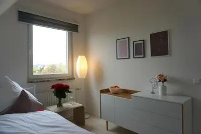 Ein Bett oder Betten in einem Zimmer der Unterkunft Apartment Miesmuschelparadies